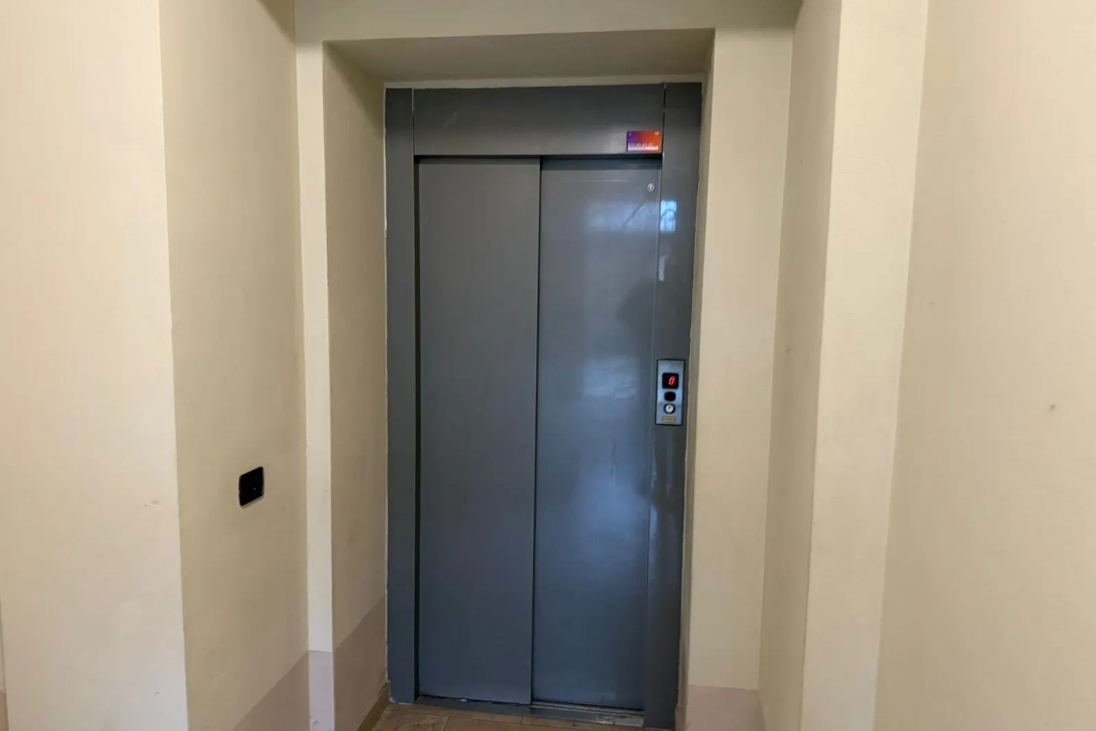 Appartamento e posto auto scoperto